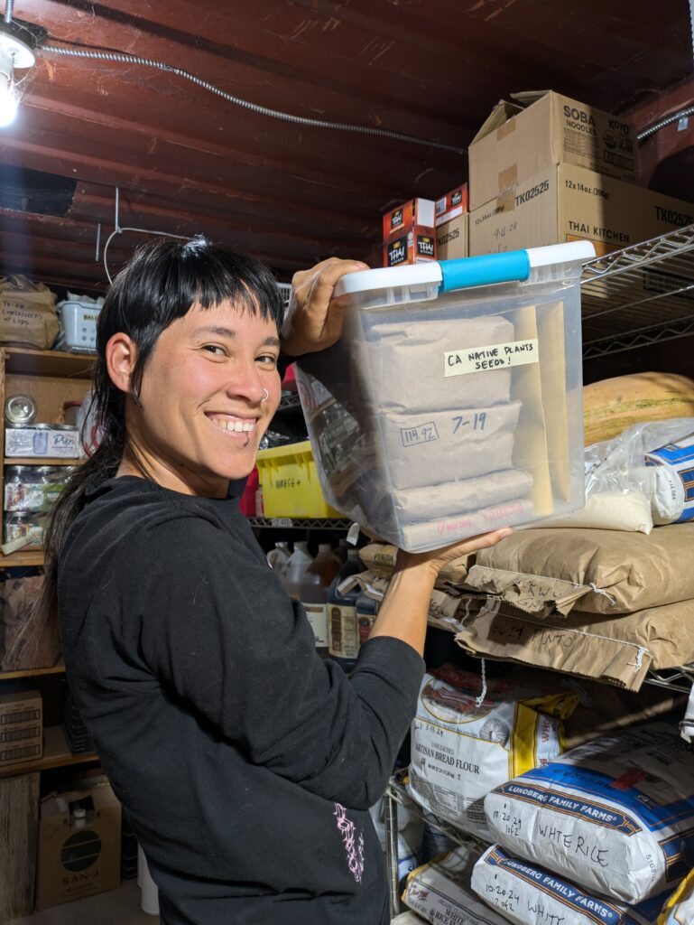 Amy Yuelapwan showing native seed collection